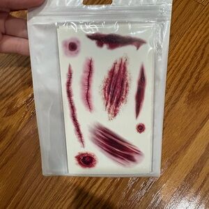 Brand new Special Effects Scar & Wound Tattoo Sheet - Burgundy Red